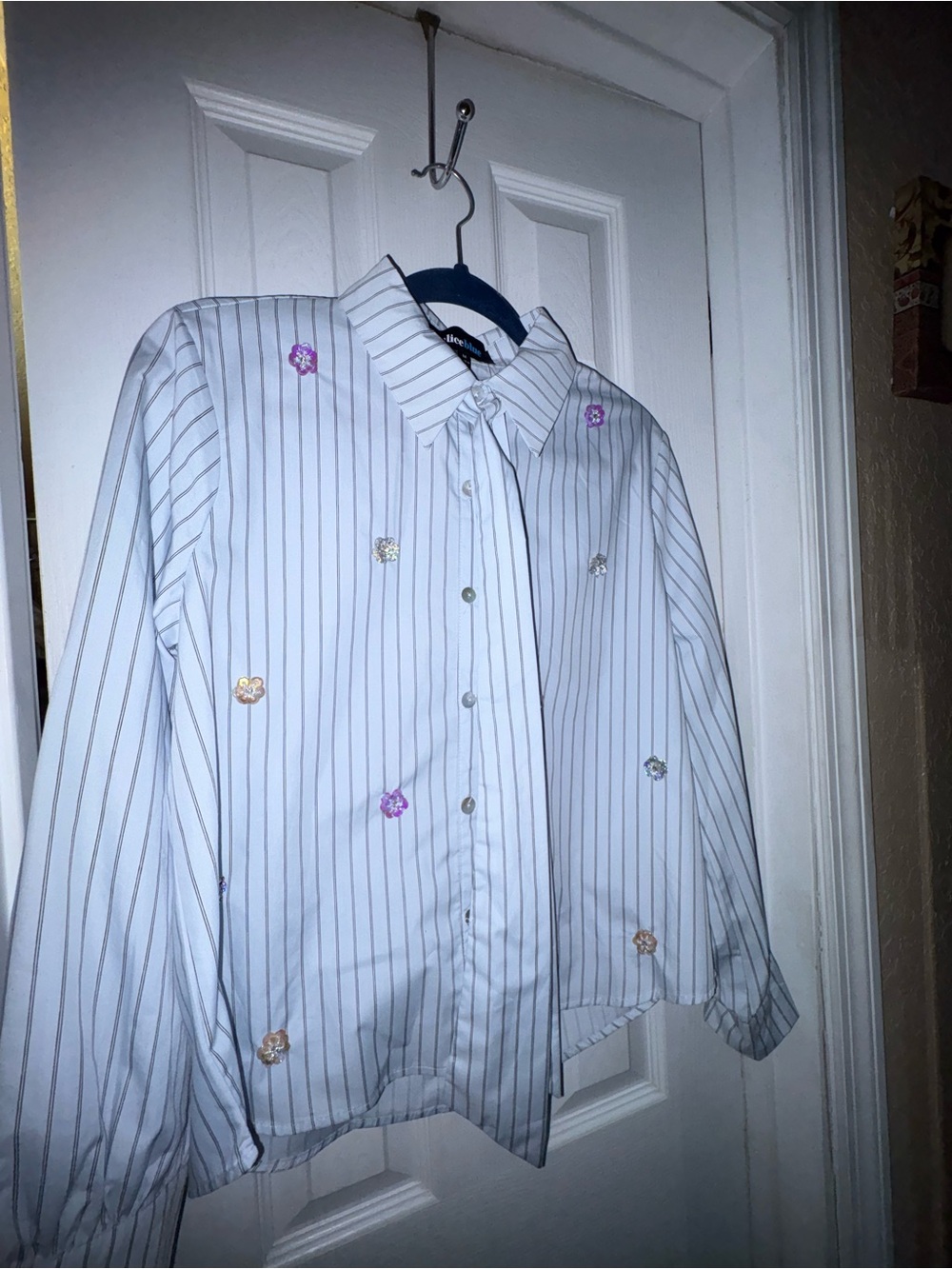 Women’s Blue Striped Button-Up Shirt with Floral Accents